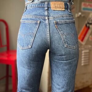 Vintage 80s Levi’s 550 Orange Tab Jeans | Mid-Blue Denim | 29" waist